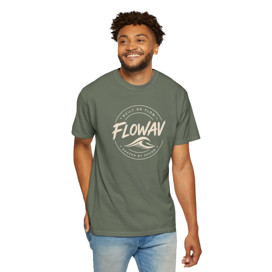 Man wearing FLOWAV Coastal Badge Tee in Moss - front view showing surf and music inspired graphic
