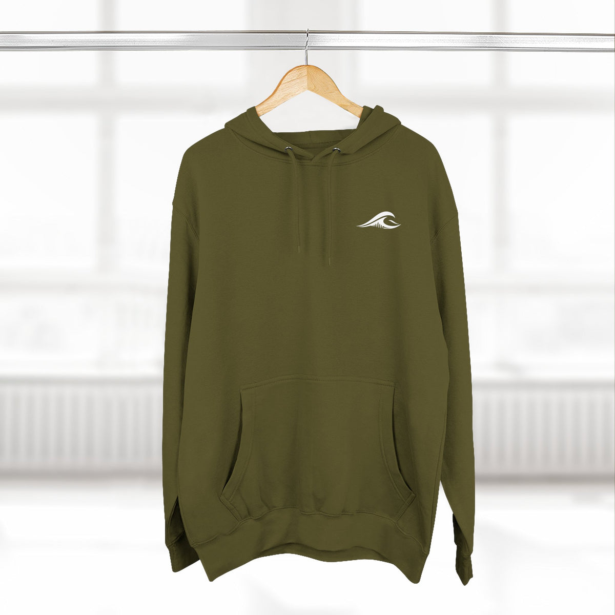 FLOWAV Coastal Graphic Hoodie in army green hanging on a wooden hanger showing the front wave logo