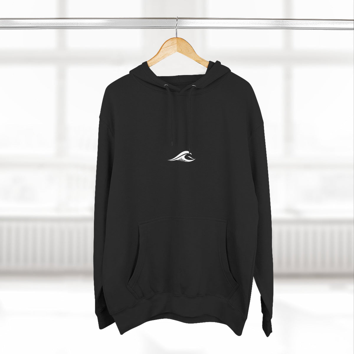 FLOWAV Signature Wave Hoodie in black hanging on a hanger showing the front wave logo