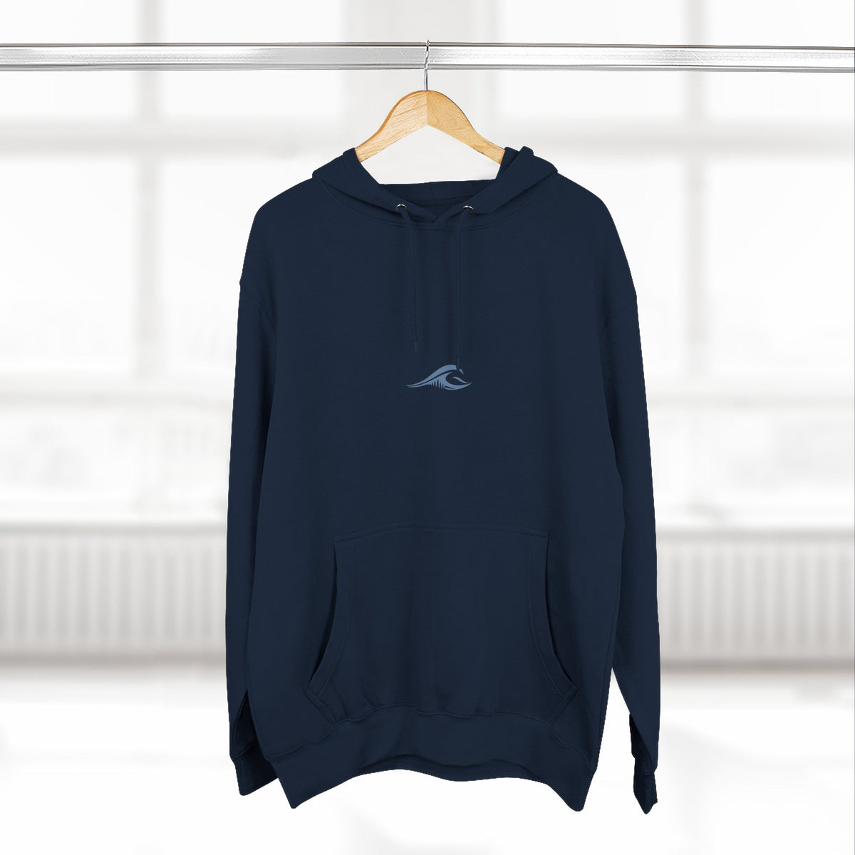 FLOWAV Signature Wave Hoodie in navy hanging on a hanger showing the front wave logo