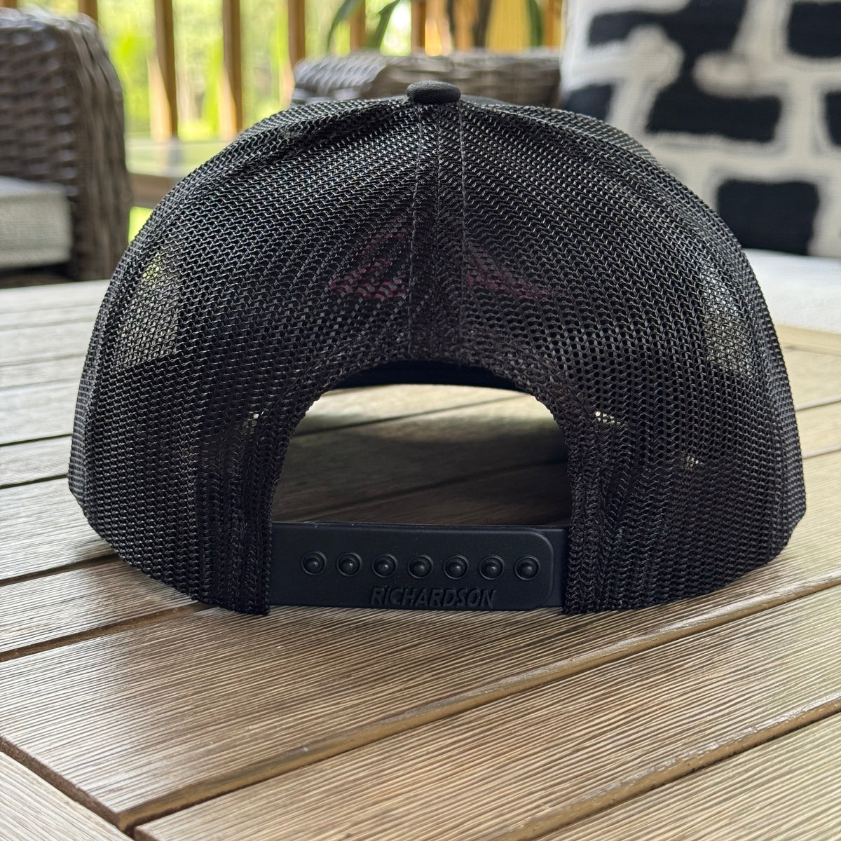 The back of the FLOWAV Richardson R112 Trucker hat showing the back snapback closure.