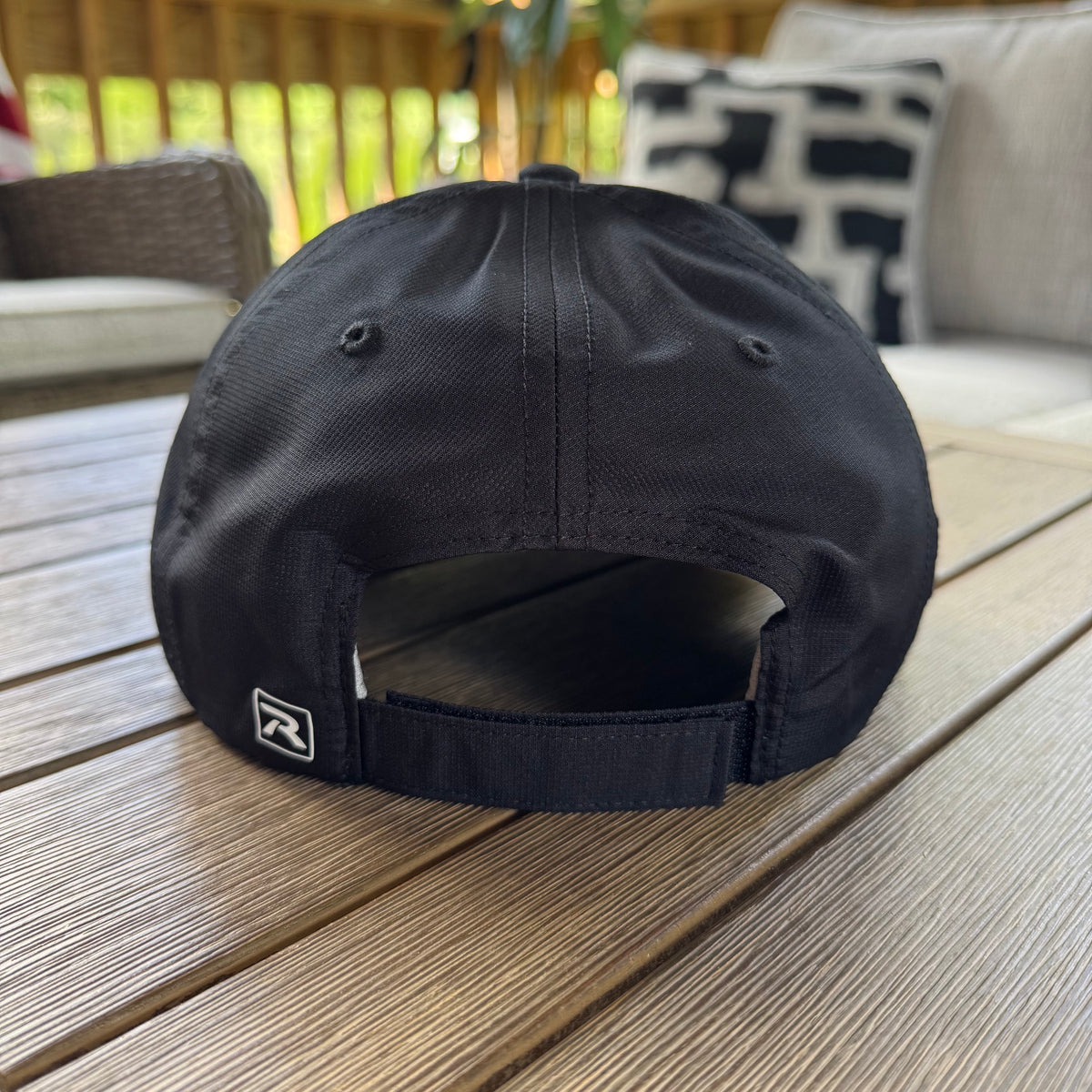 The back of the FLOWAV Pink Edition Richardson R55 classic dad hat showing the back hide-away cloth back strap closure.