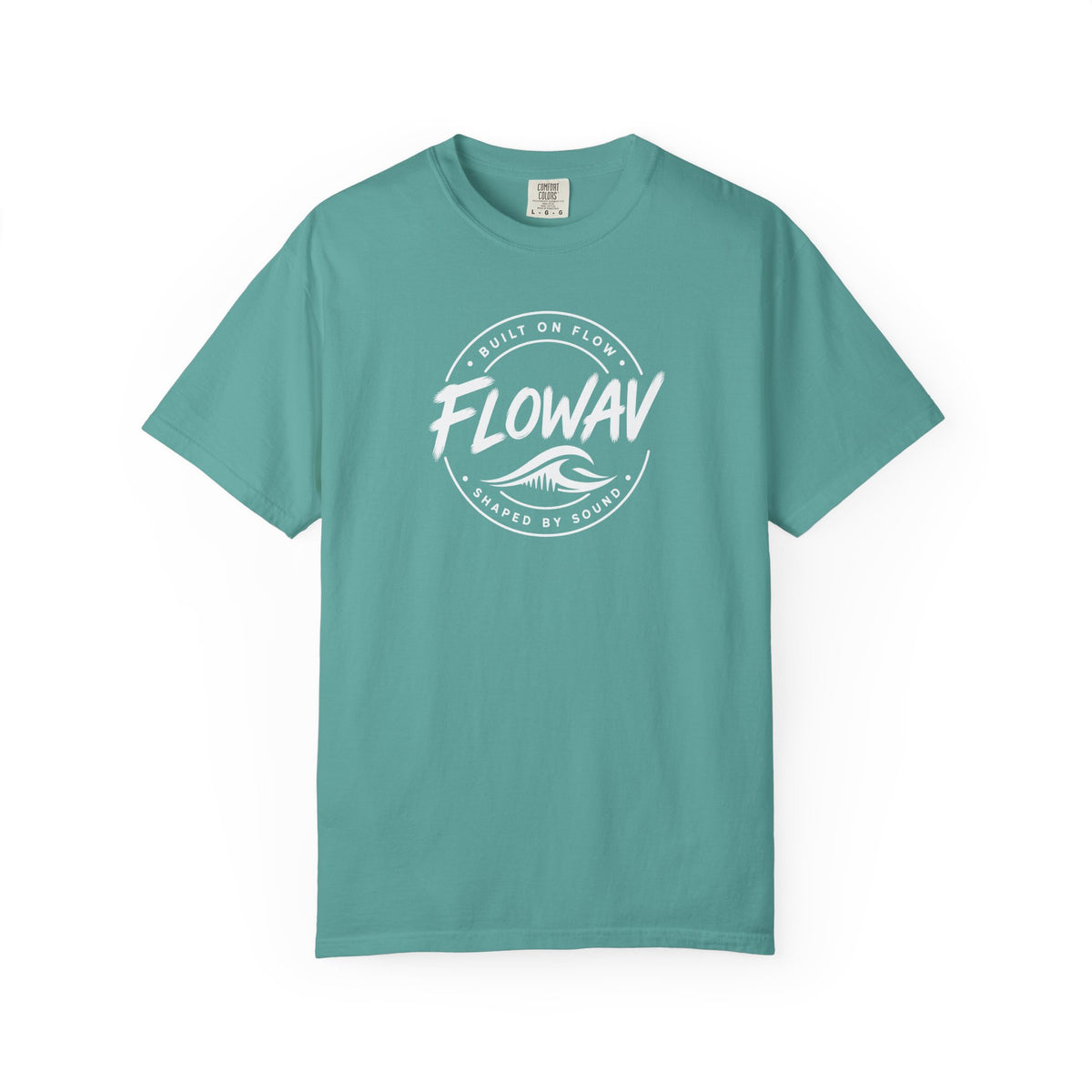 FLOWAV Coastal Badge Tee in seafoam laid flat showing the front badge graphic.