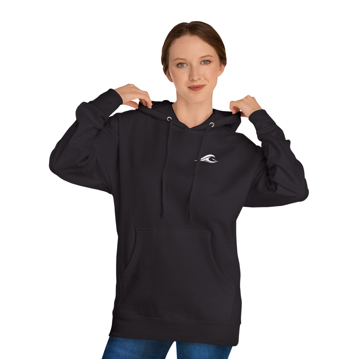 A woman wearing a FLOWAV Coastal Graphic pullover hoodie in black showing the front white flowav logo on the chest