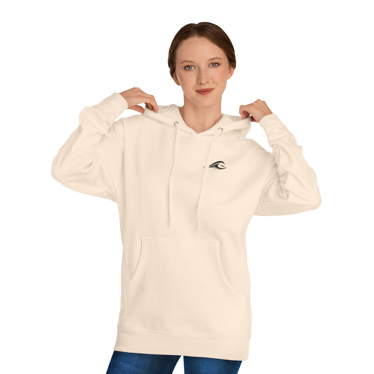 A woman wearing a FLOWAV Coastal Graphic pullover hoodie in bone showing the front flowav logo on the chest