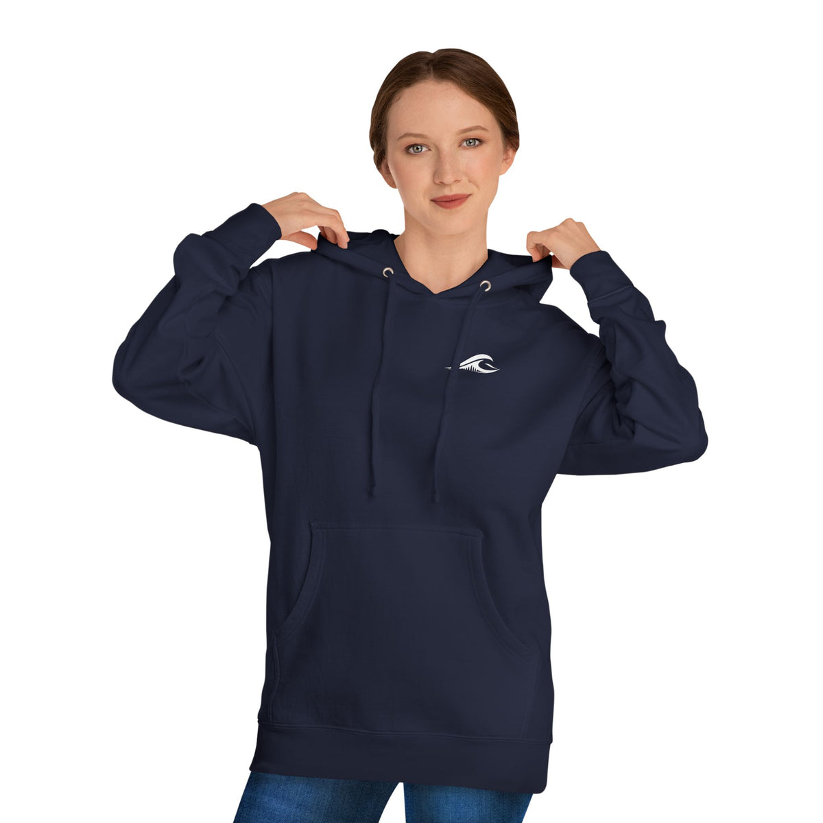 A woman wearing a FLOWAV Coastal Graphic pullover hoodie in classic navy showing the front white flowav logo on the chest