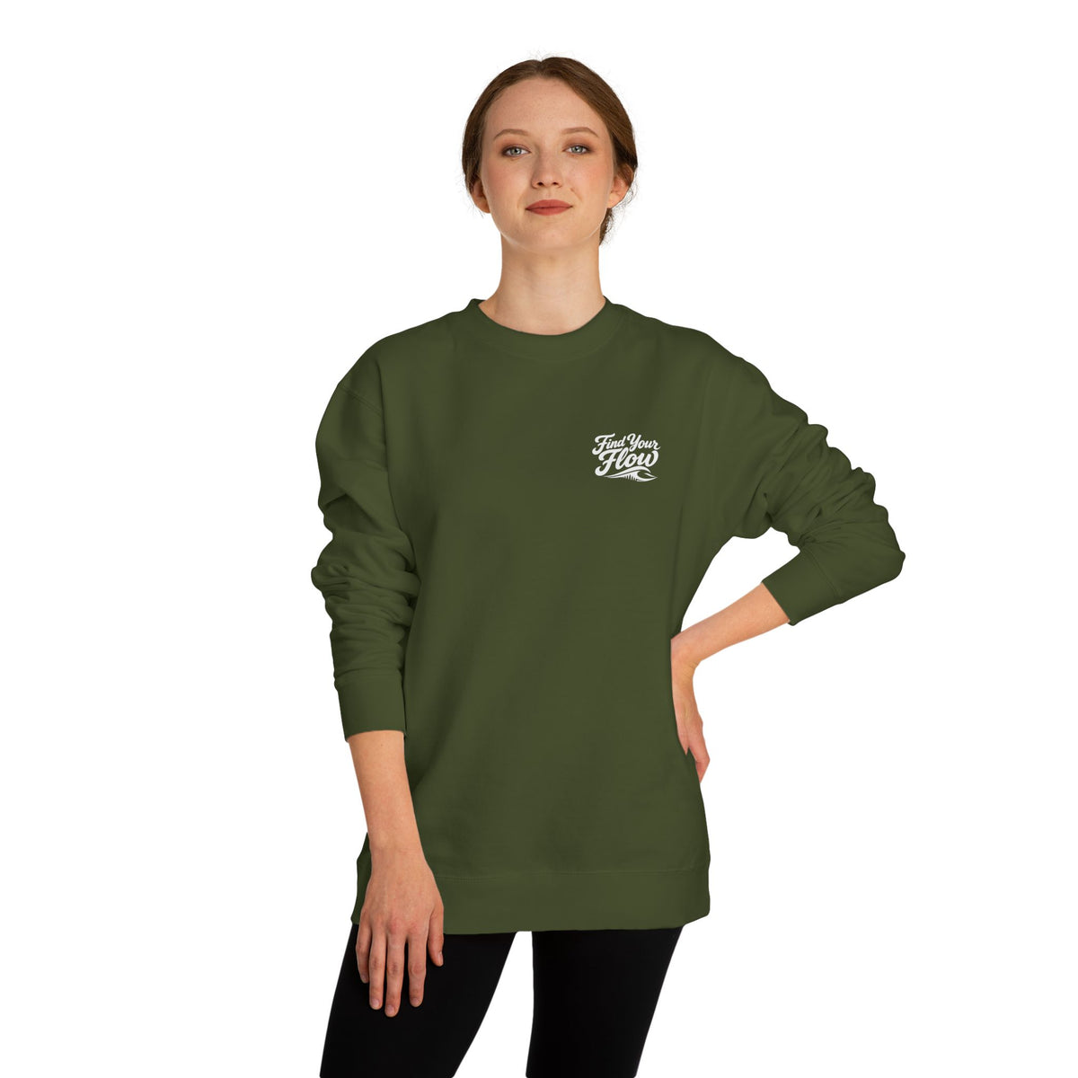A woman wearing a FLOWAV Find Your Flow crewneck sweatshirt in army showing the front graphic and wave detail.