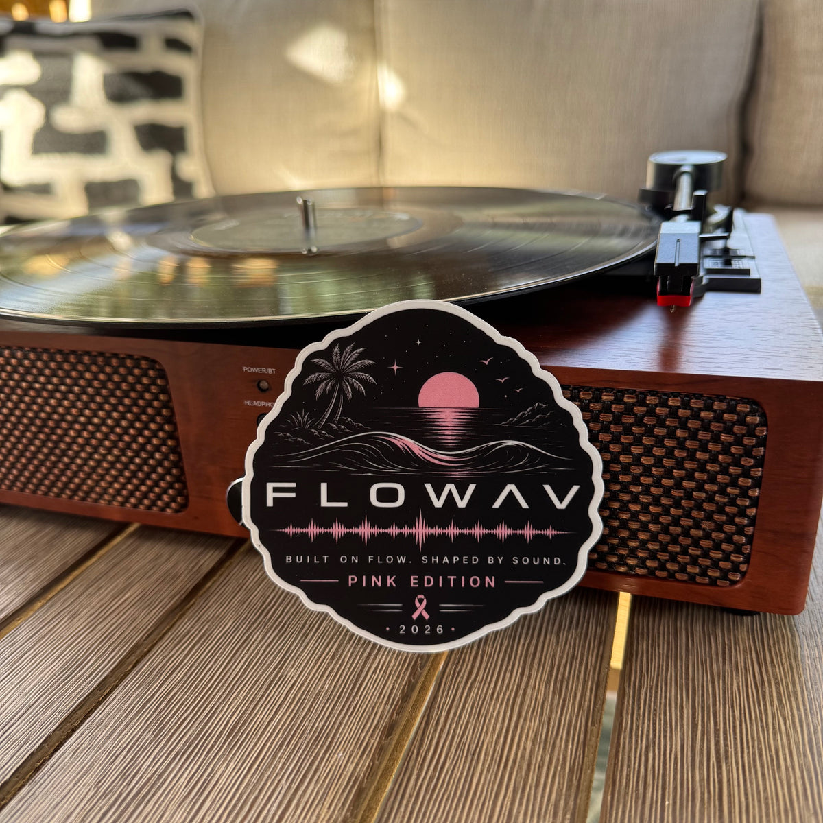 FLOWAV Pink Edition sticker showing an ocean wave and pink sunset with a soundwave resting against a wood record player.