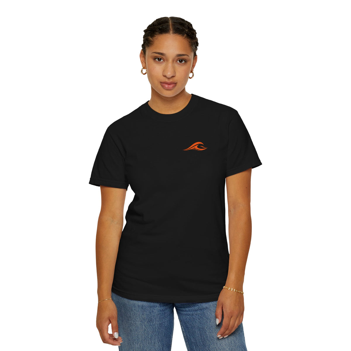 A woman wearing the FLOWAV Ride the Freakuency Graphic Tee in black showing the front orange wave.
